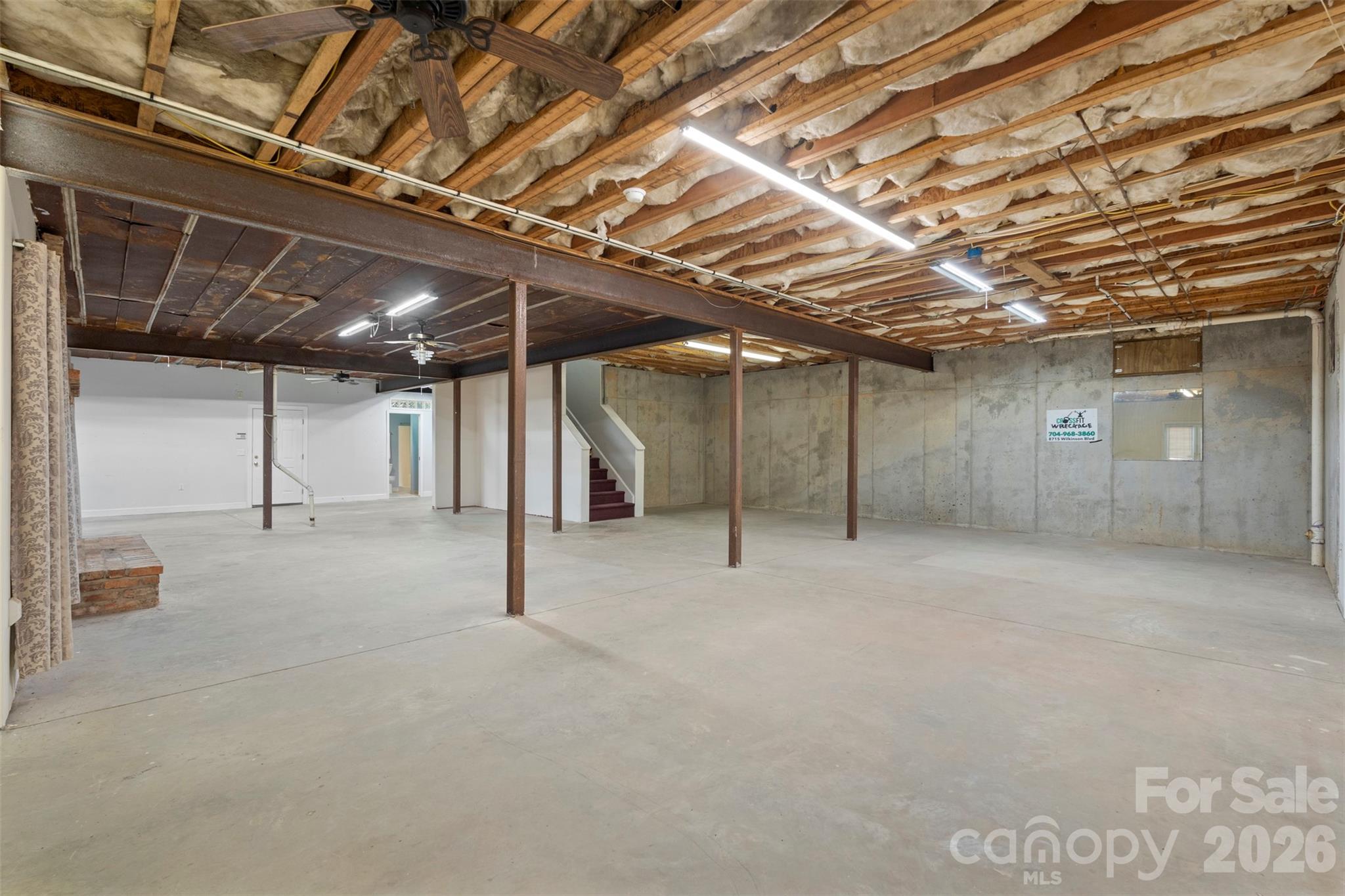 12711 Moores Chapel Road Charlotte, NC 28214 - Photo 45 of 48 a view of empty room with wooden ceiling