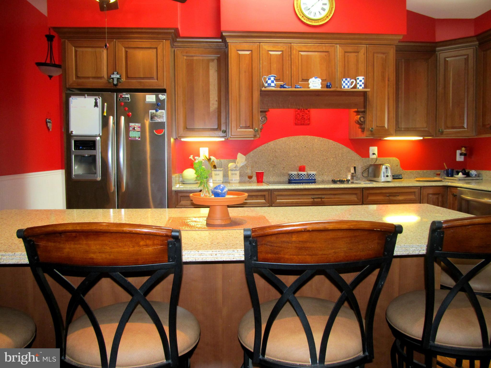 6206 Medora Road Linthicum, MD 21090 - Photo 3 of 30 a table and chairs in front of a door