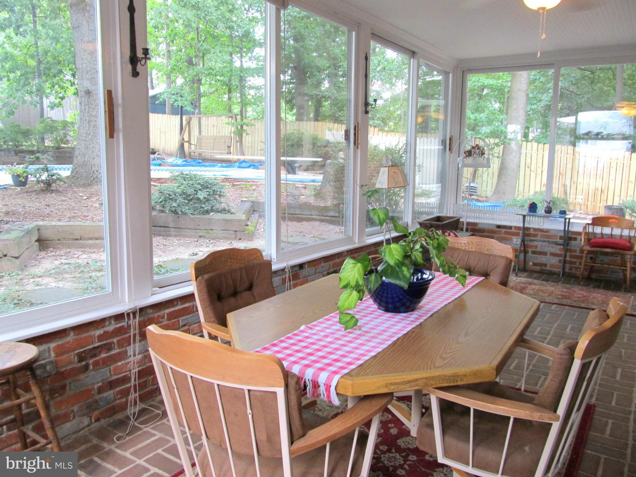 6206 Medora Road Linthicum, MD 21090 - Photo 24 of 30 a view of a dining room with furniture window and outside view