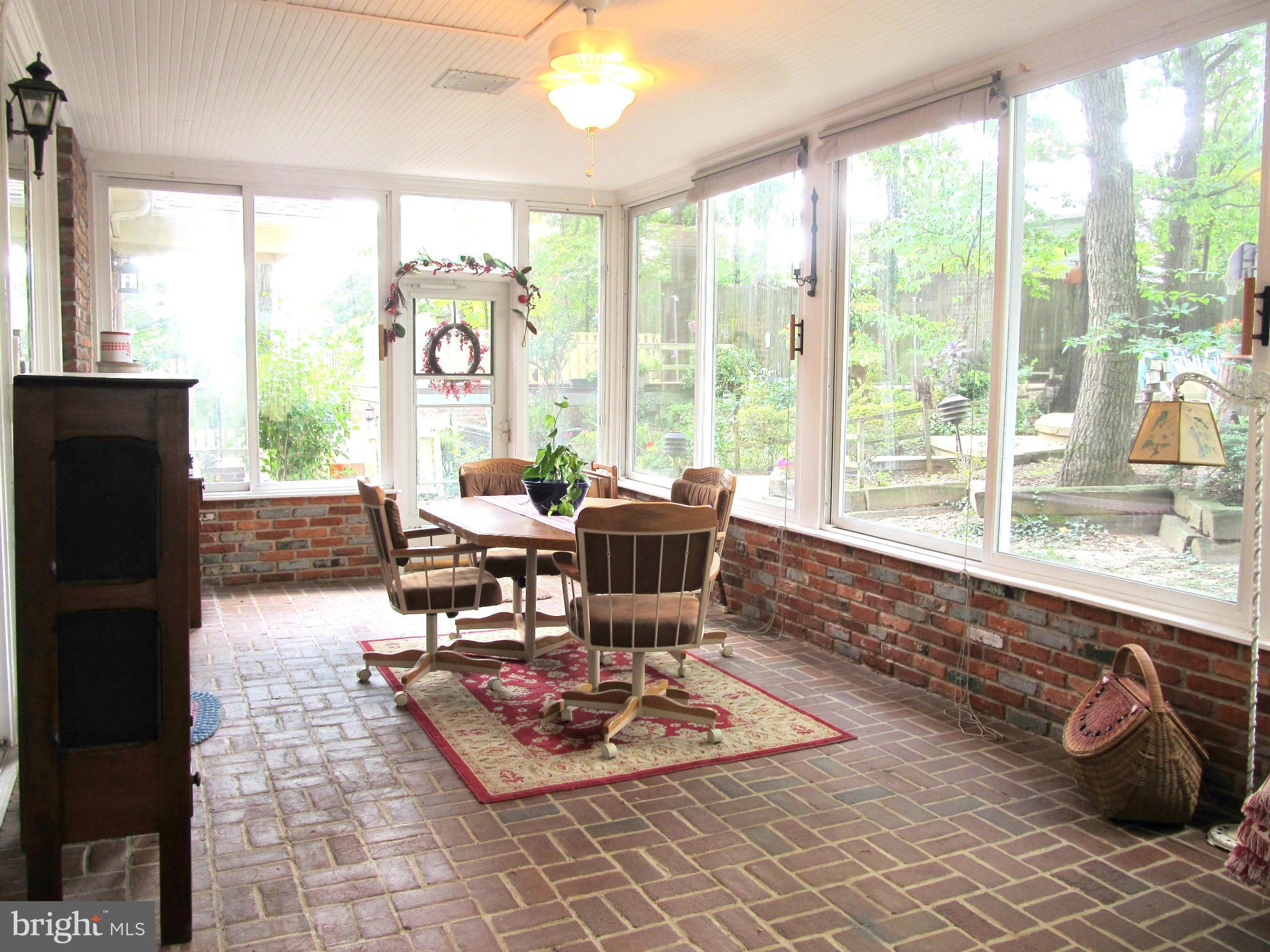 6206 Medora Road Linthicum, MD 21090 - Photo 25 of 30 a living room with furniture and large windows