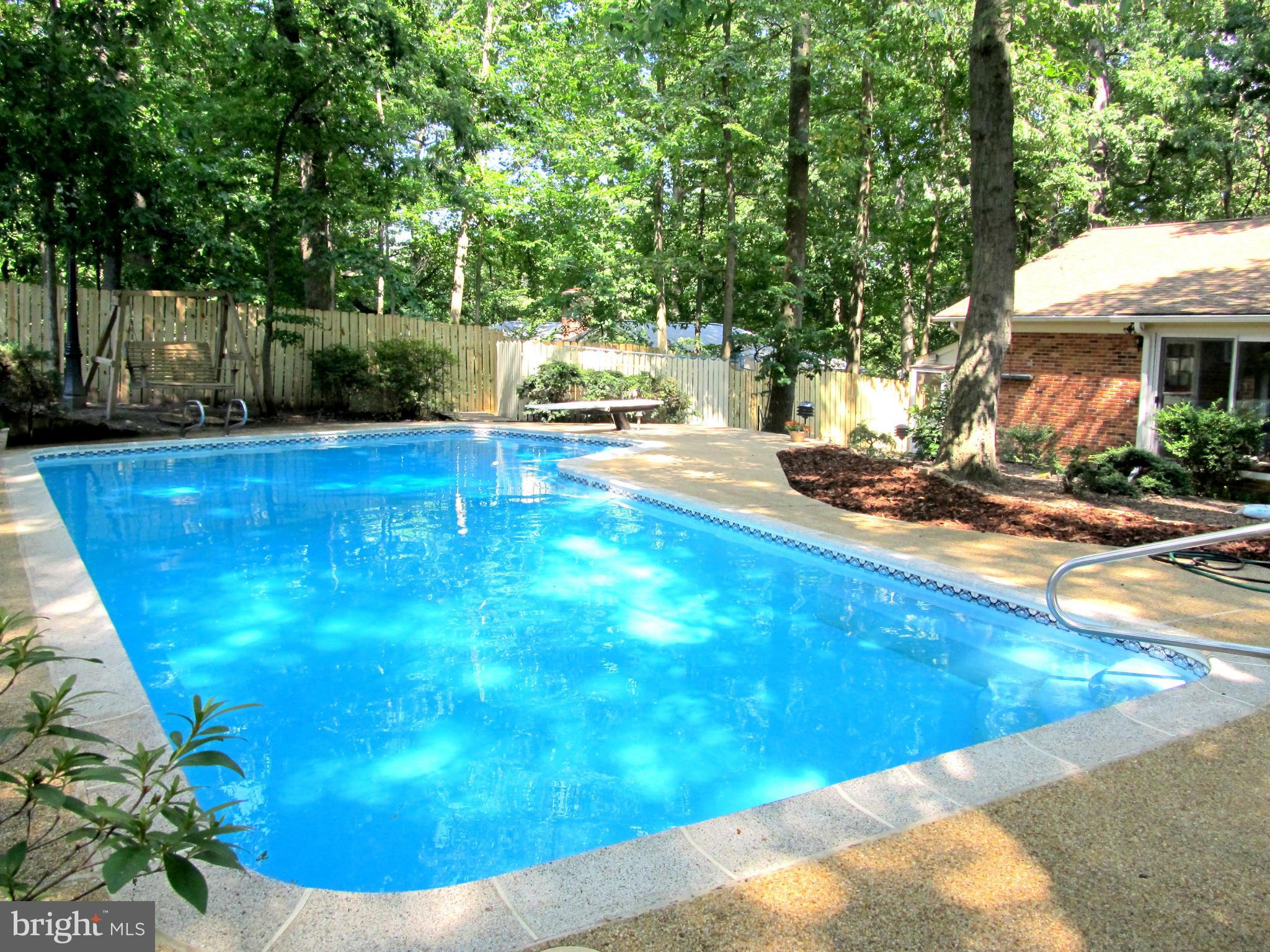 6206 Medora Road Linthicum, MD 21090 - Photo 27 of 30 a view of a swimming pool with sitting area