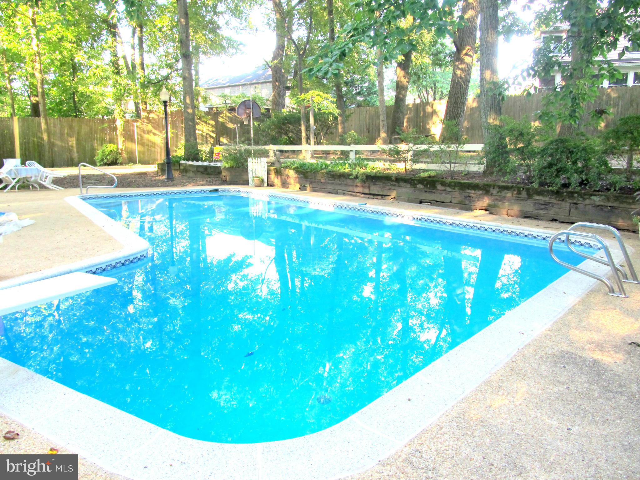 6206 Medora Road Linthicum, MD 21090 - Photo 28 of 30 a view of a swimming pool with a yard