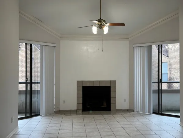 an empty room with fireplace