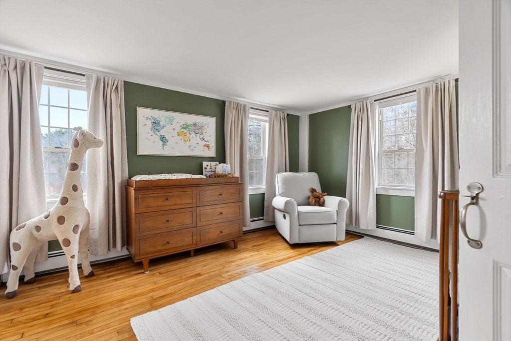 437 Linebrook Road Ipswich, MA 01938 - Photo 30 of 41 a bedroom with furniture and large window