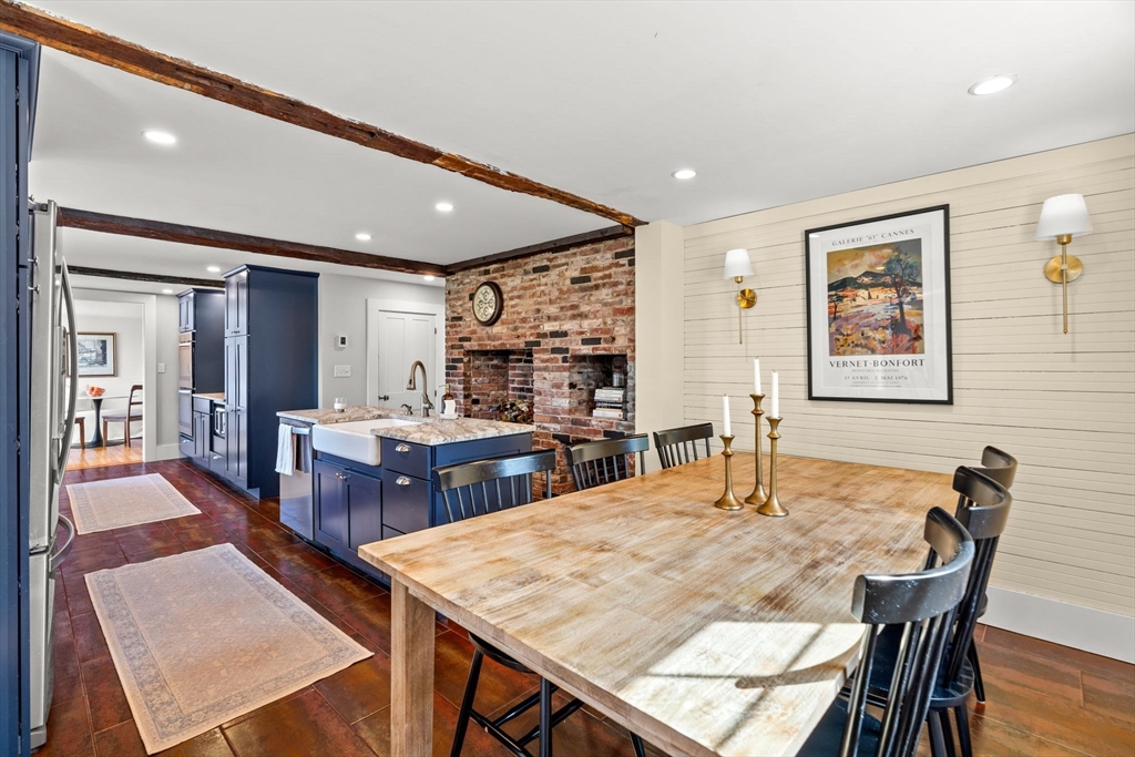 437 Linebrook Road Ipswich, MA 01938 - Photo 5 of 41 a dining hall with dining table and chairs