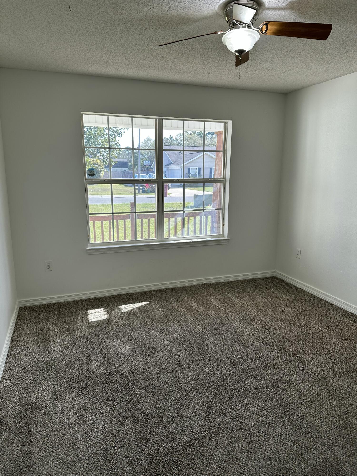 4195 Berry Circle Pace, FL 32571 - Photo 11 of 50 an empty room with a empty space and a window