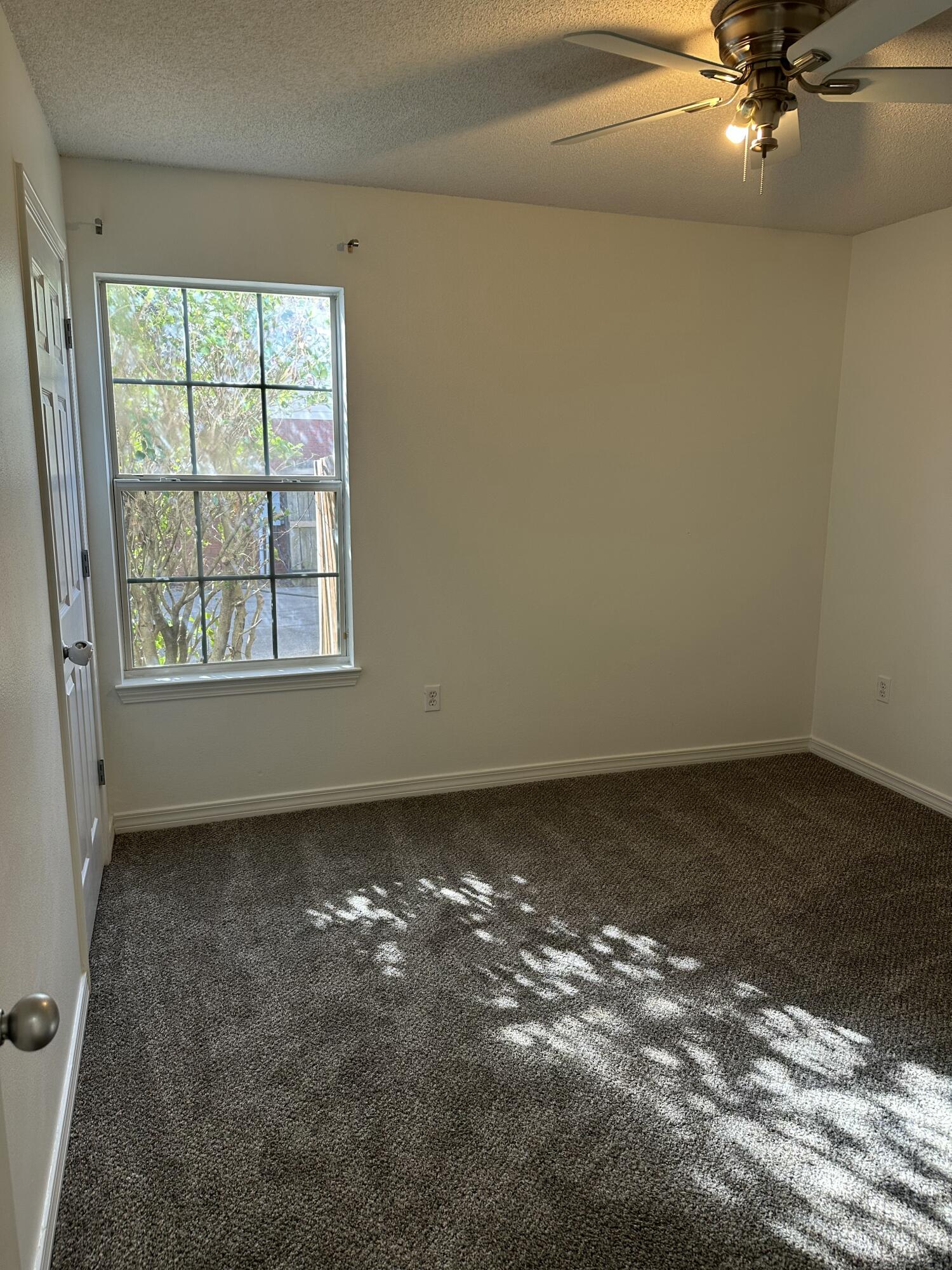 4195 Berry Circle Pace, FL 32571 - Photo 12 of 50 an empty room with a window