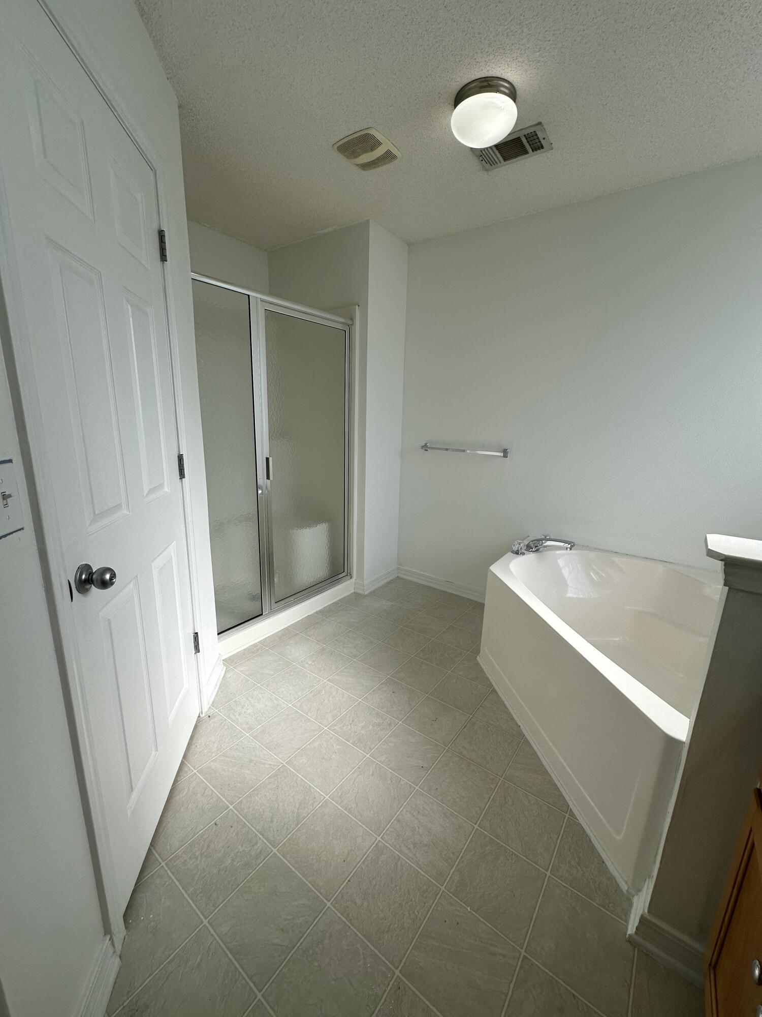 4195 Berry Circle Pace, FL 32571 - Photo 27 of 50 a view of a bathtub and a cabinet in a room