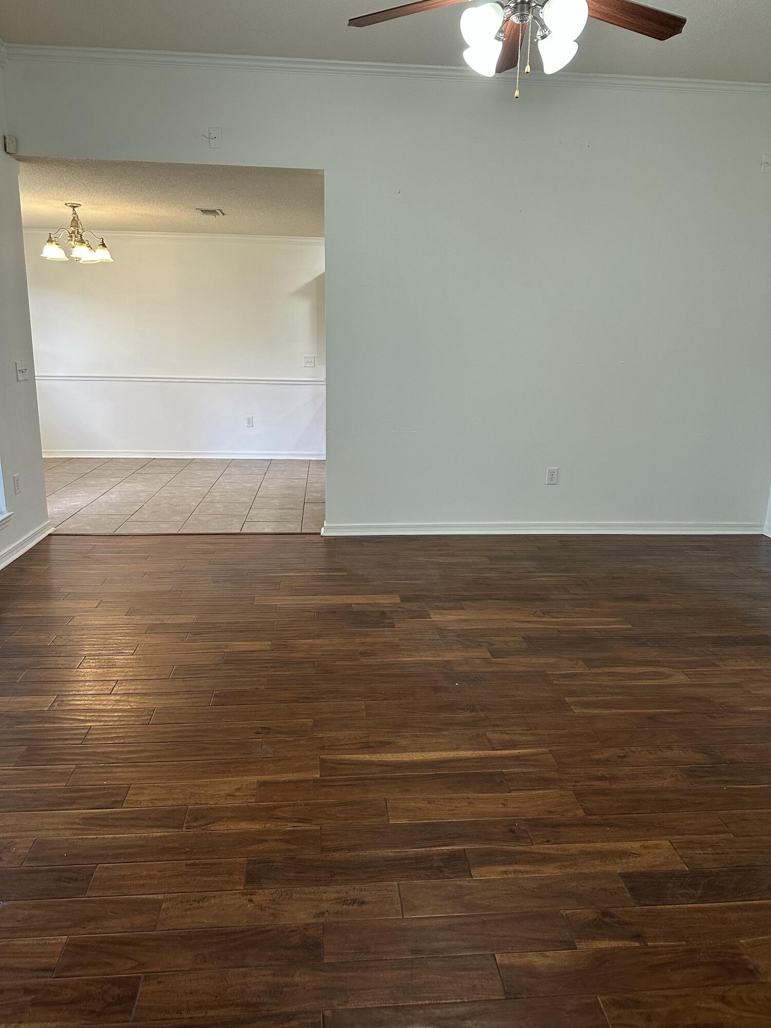 4195 Berry Circle Pace, FL 32571 - Photo 29 of 50 a view of a room with wooden floor