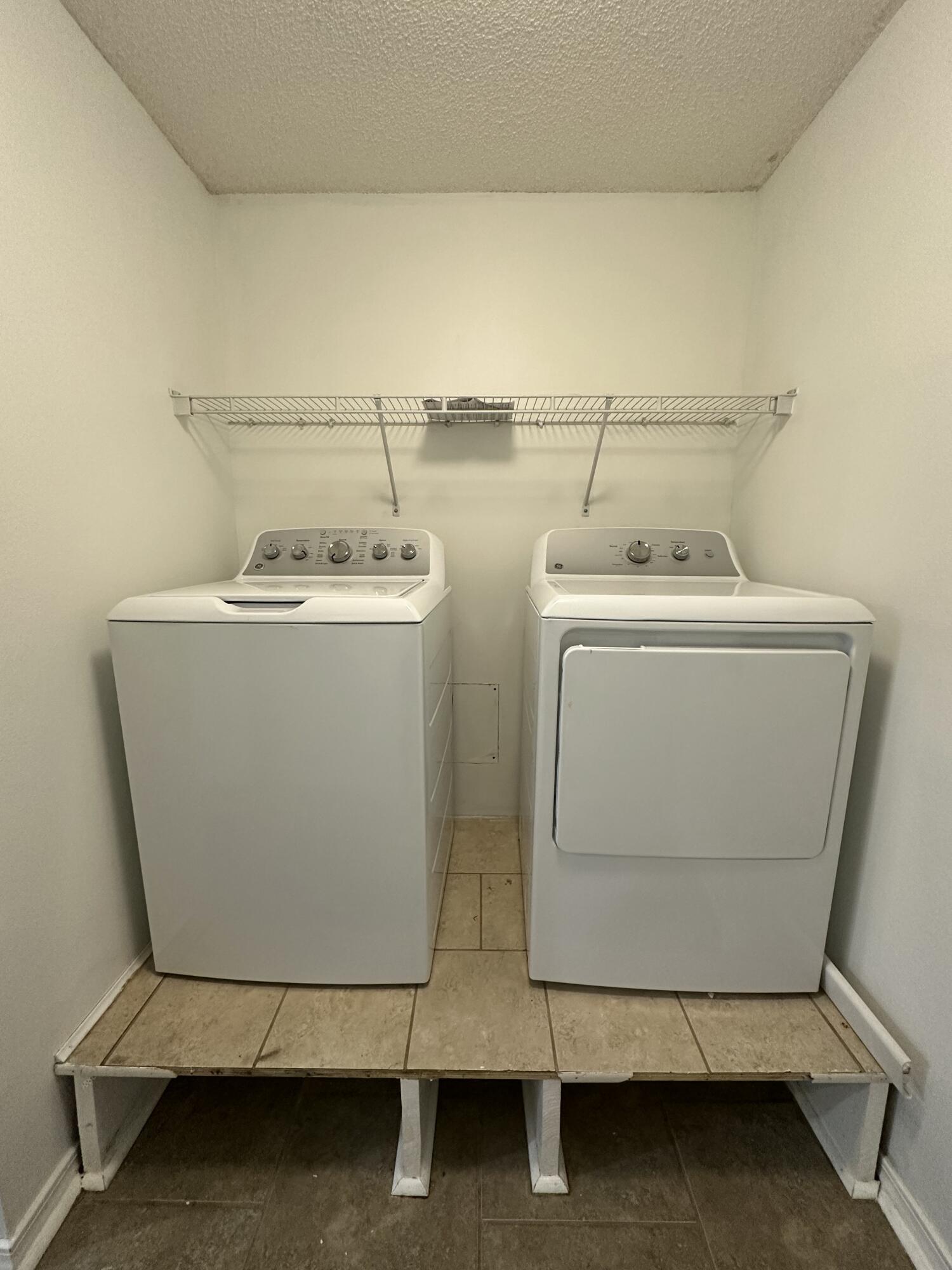4195 Berry Circle Pace, FL 32571 - Photo 41 of 50 a utility room with dryer and washer