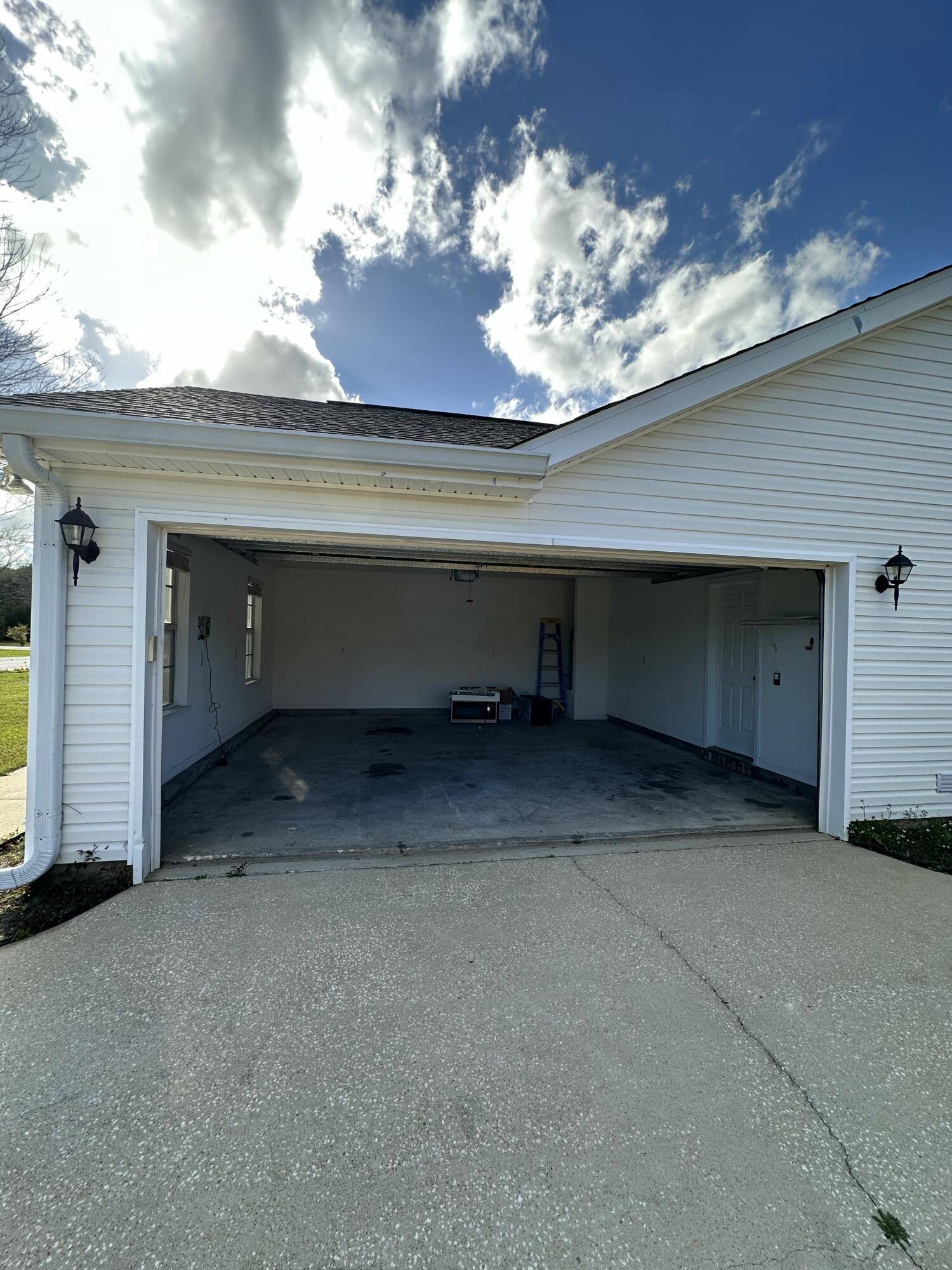 4195 Berry Circle Pace, FL 32571 - Photo 42 of 50 a view of a room that has a large tree