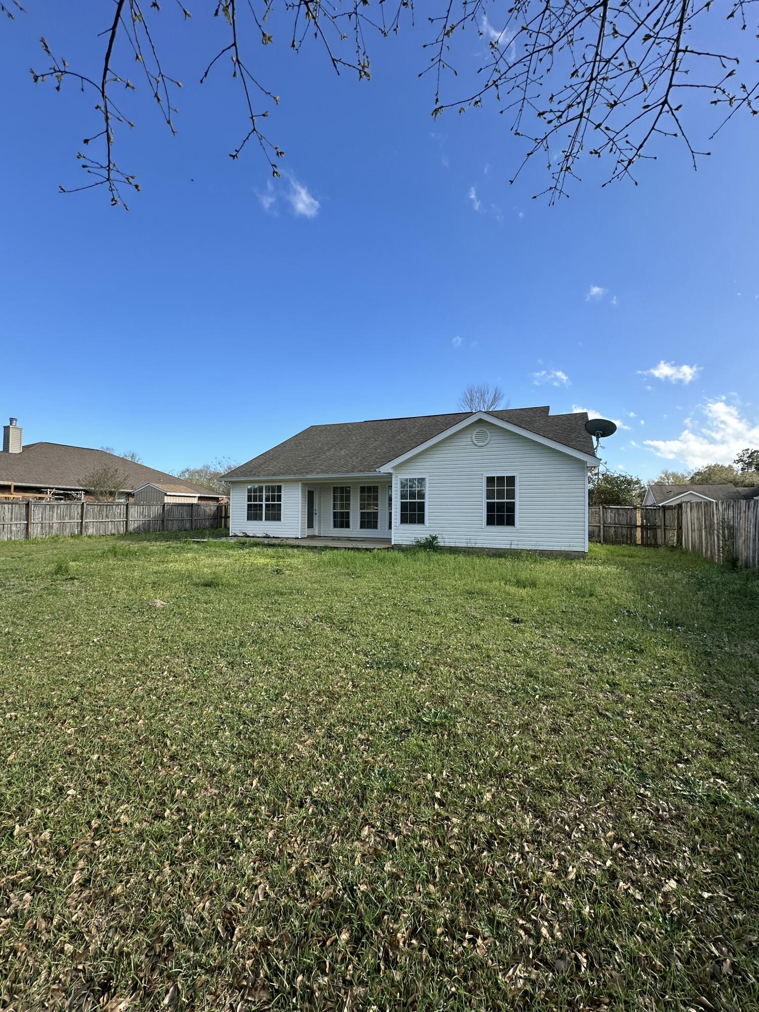 4195 Berry Circle Pace, FL 32571 - Photo 49 of 50 a house view with a garden space