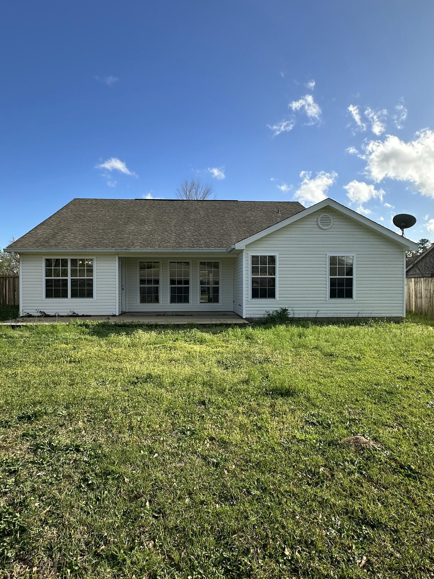 4195 Berry Circle Pace, FL 32571 - Photo 50 of 50 a view of a house with a backyard