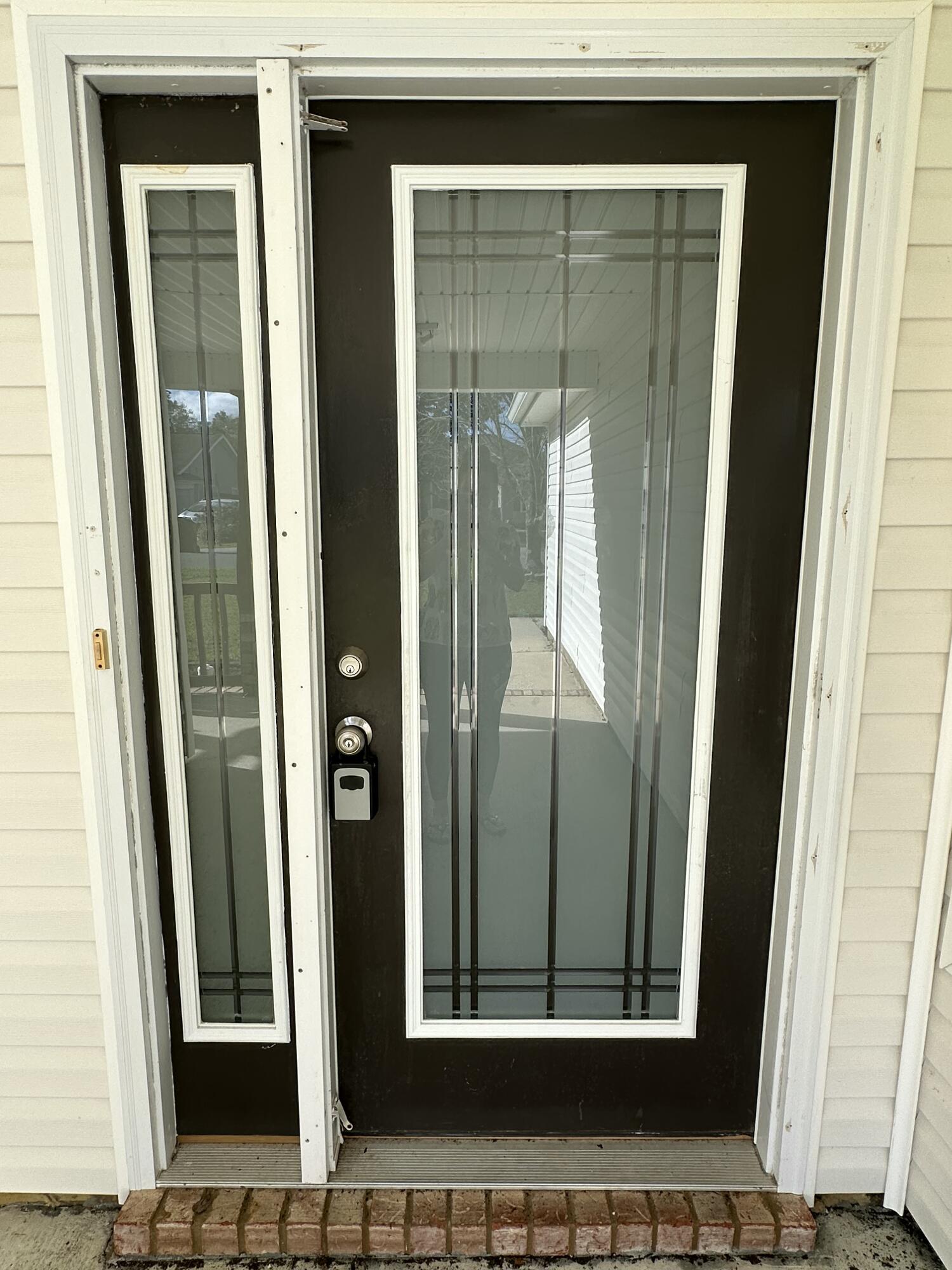 4195 Berry Circle Pace, FL 32571 - Photo 5 of 50 a view of a door and a window
