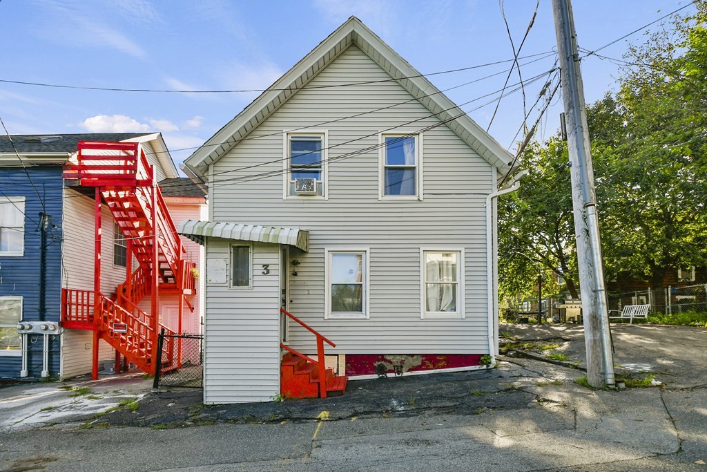 3 Ely Street Worcester, MA 01610 - Photo 1 of 4 a front view of a house