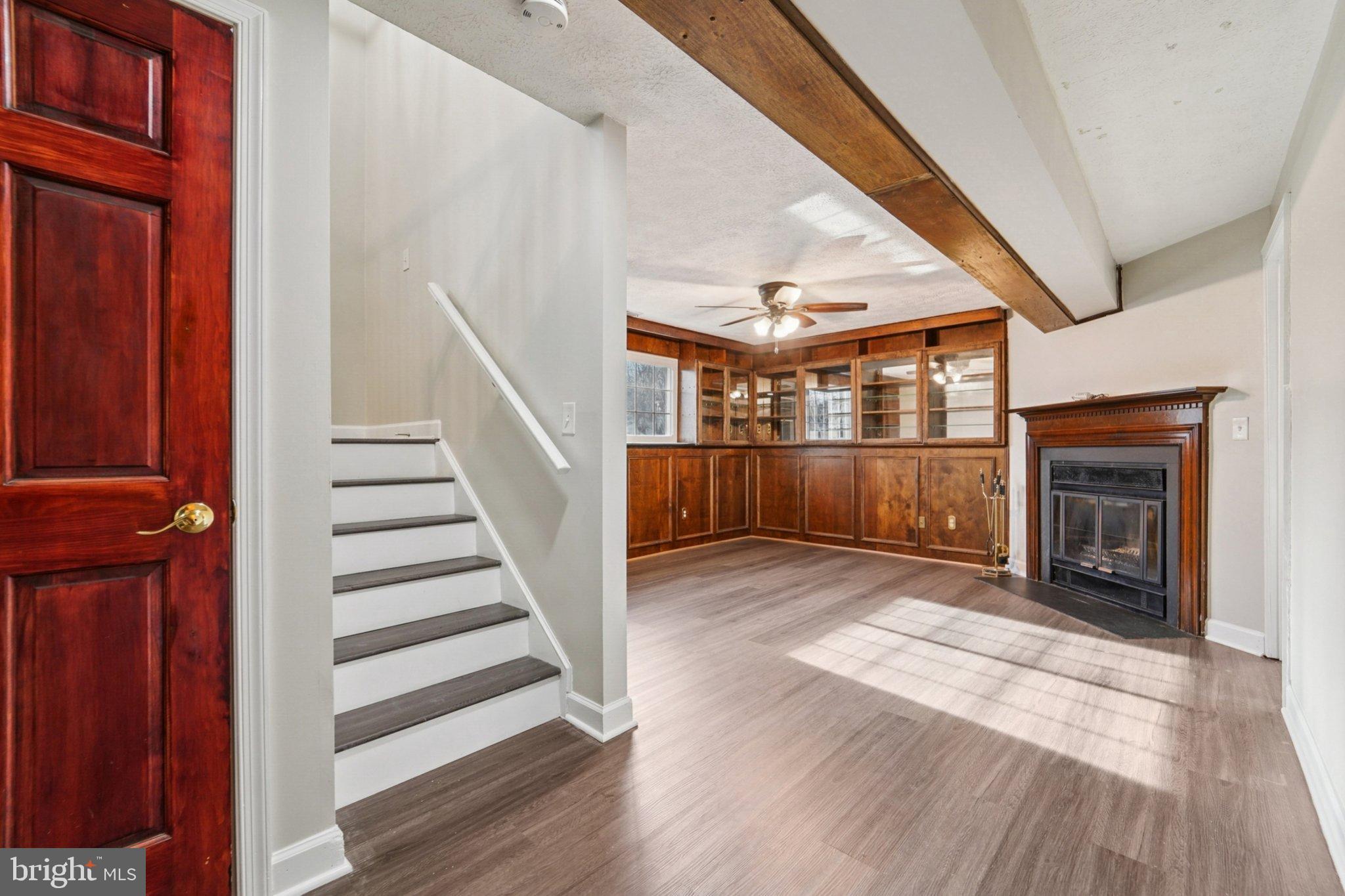 308 Raussell Place Severna Park, MD 21146 - Photo 15 of 31 a view of front door with hallway and wooden floor