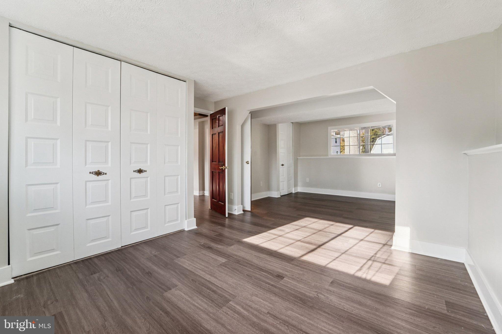308 Raussell Place Severna Park, MD 21146 - Photo 20 of 31 a view of a livingroom with wooden floor