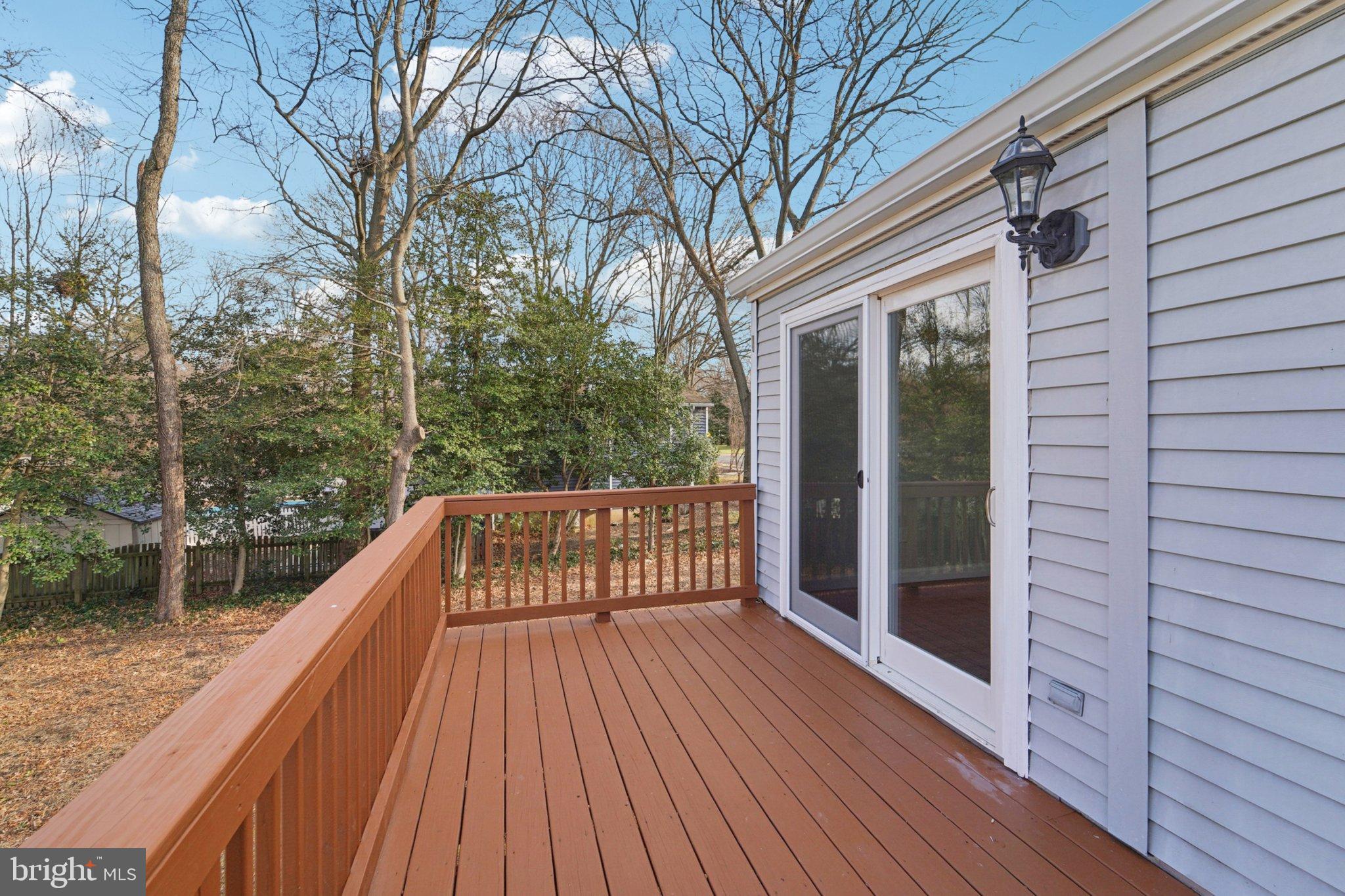 308 Raussell Place Severna Park, MD 21146 - Photo 26 of 31 a view of balcony with wooden floor and fence