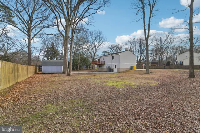 a house with trees in front of it