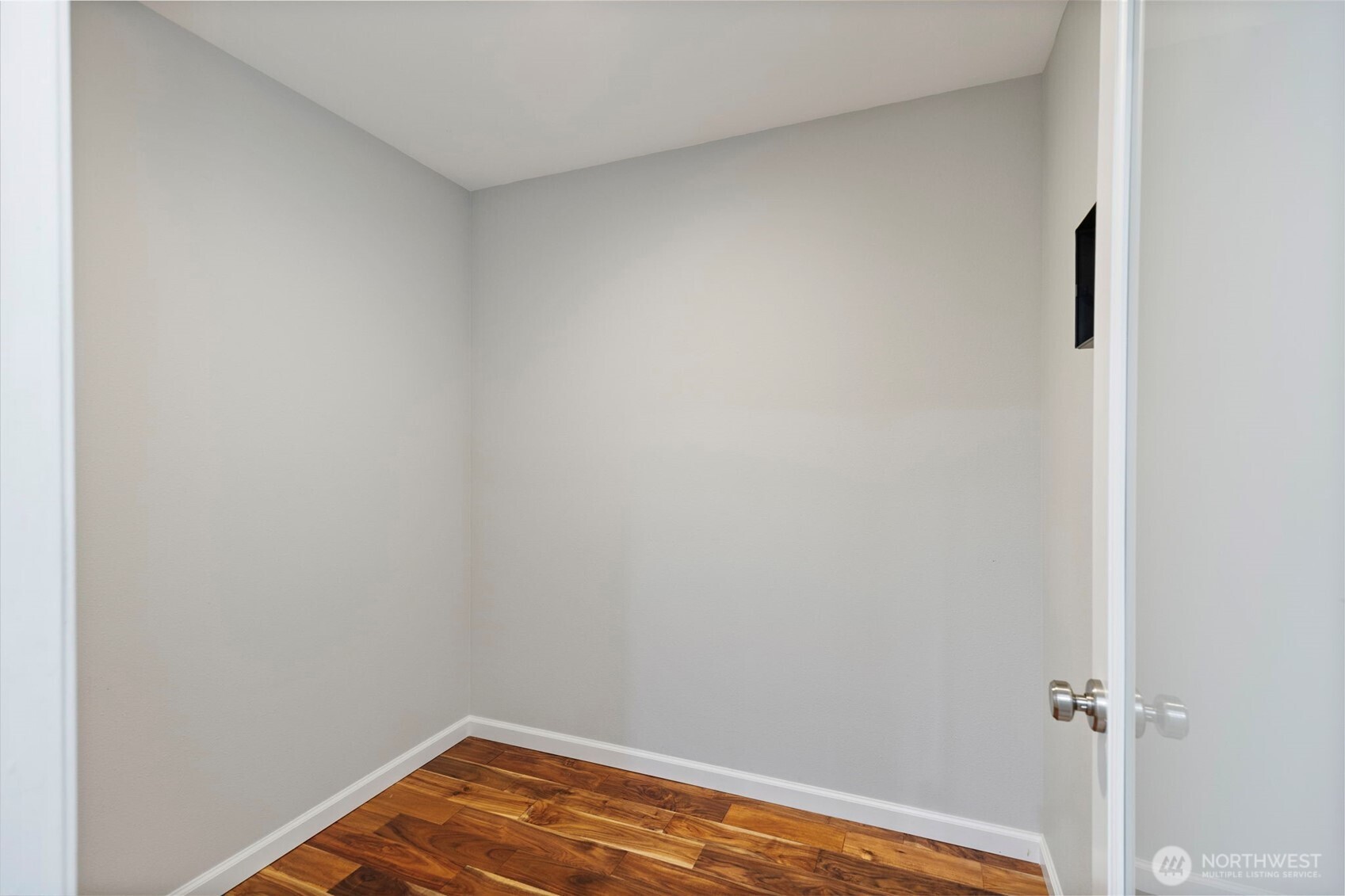15219 Wright Bliss Road Northwest Gig Harbor, WA 98329 - Photo 17 of 39 a view of a room with wooden floor