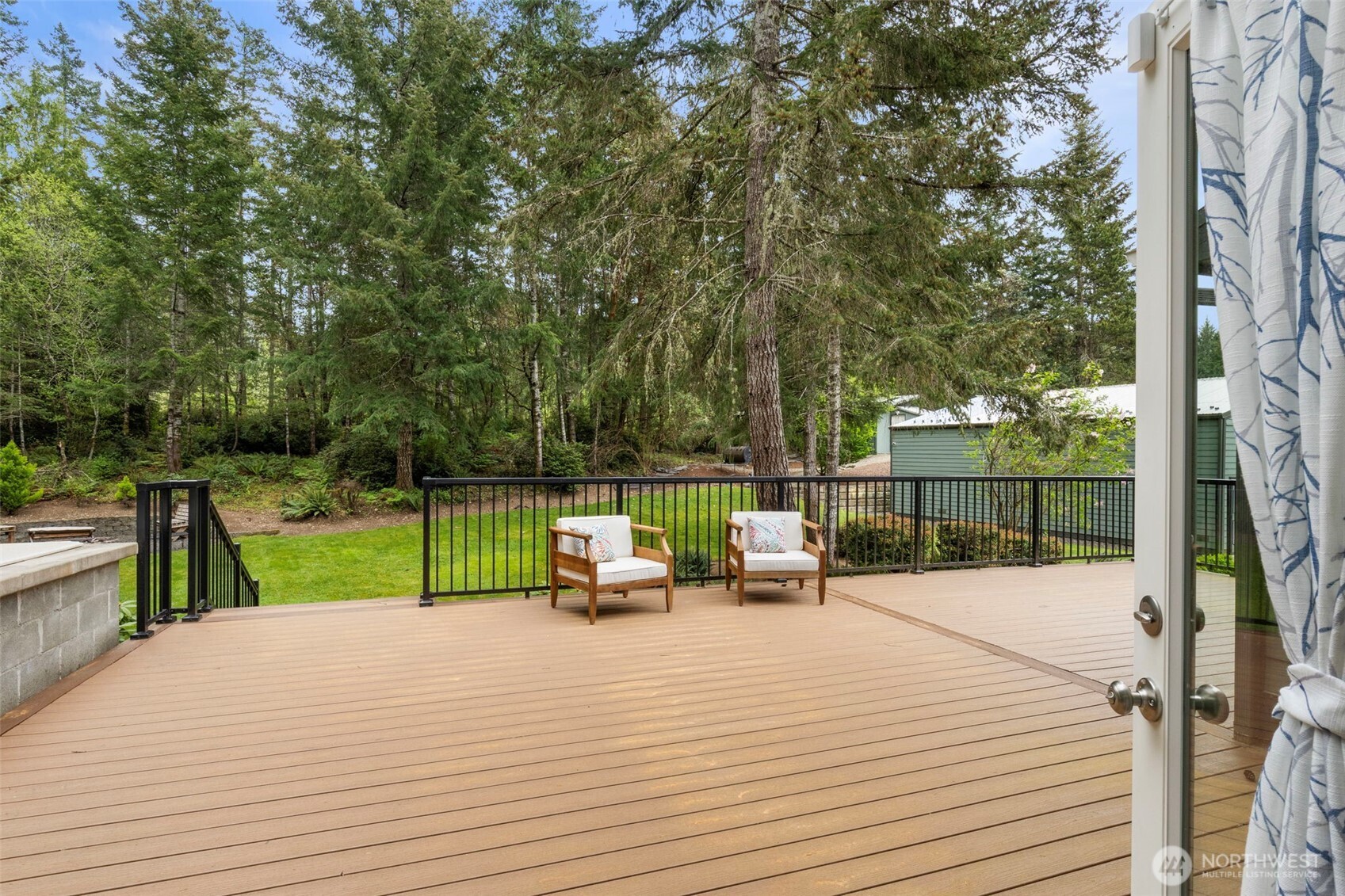 15219 Wright Bliss Road Northwest Gig Harbor, WA 98329 - Photo 30 of 39 a view of outdoor space with seating