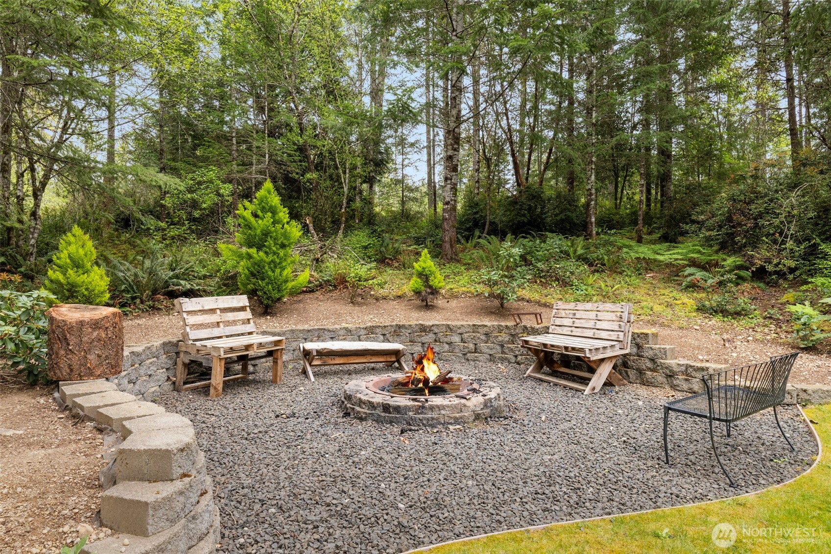 15219 Wright Bliss Road Northwest Gig Harbor, WA 98329 - Photo 35 of 39 a view of a backyard with sitting area