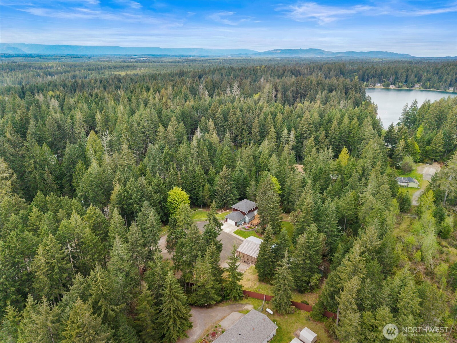 15219 Wright Bliss Road Northwest Gig Harbor, WA 98329 - Photo 37 of 39 a view of mountain with lake view