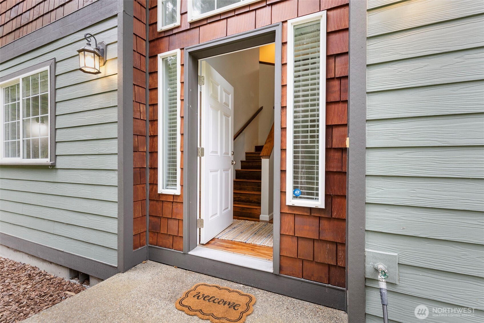 15219 Wright Bliss Road Northwest Gig Harbor, WA 98329 - Photo 7 of 39 a view of a door of the house