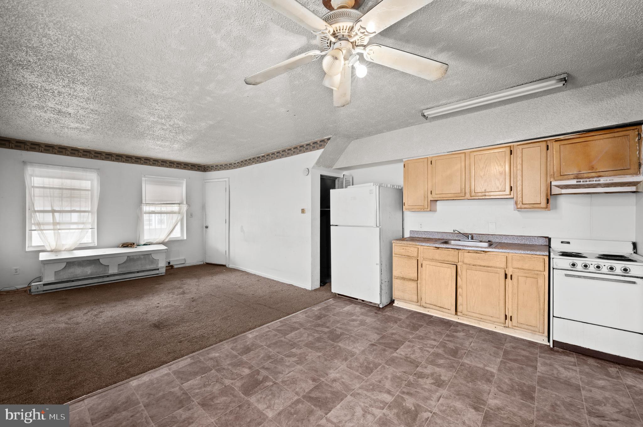 5819 Theodore Street Philadelphia, PA 19143 - Photo 13 of 37 Living Room & Kitchen (Unit 2)