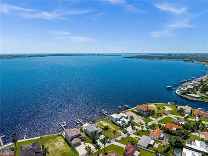 an aerial view of a houses with outdoor space