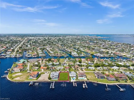 an aerial view of a city with lots of residential buildings