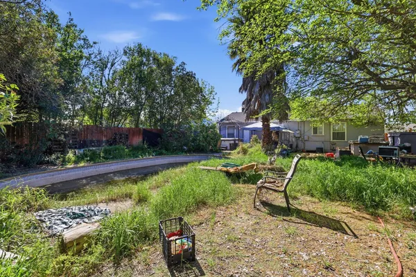 a view of a garden with a patio