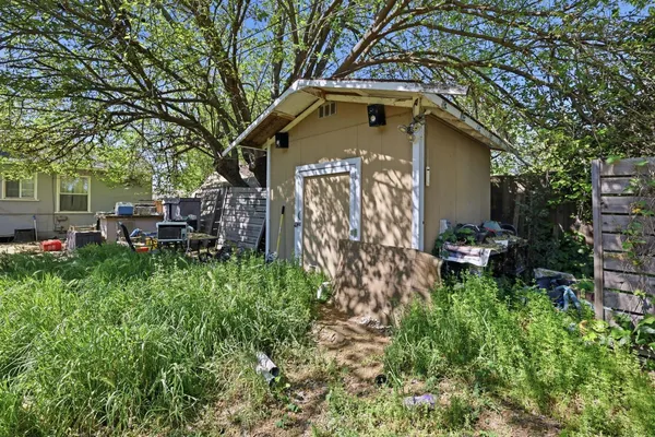 a house view with a outdoor space