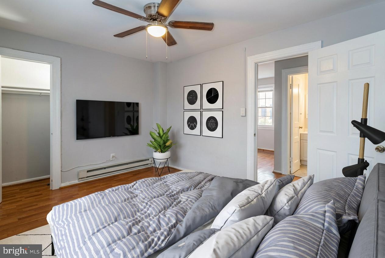 2415 Ontario Road Northwest, Unit 301 Washington, DC 20009 - Photo 2 of 25 a living room with furniture and a flat screen tv