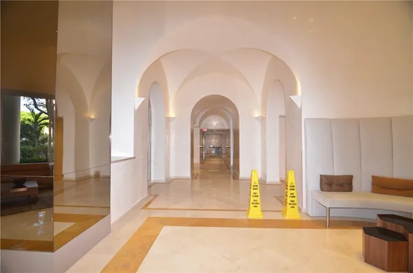 a view of a car park in front of a building