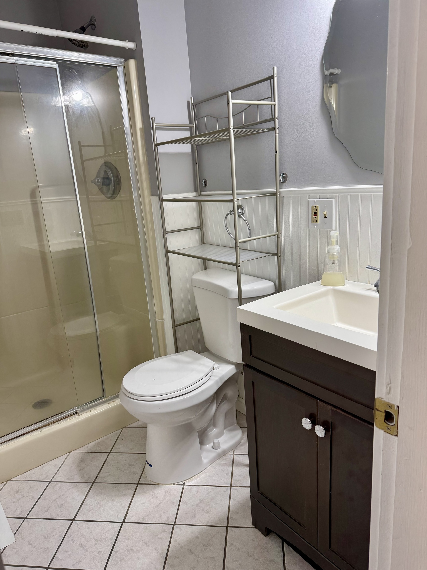 50 Holbrook Street Ansonia, CT 06401 - Photo 11 of 11 a bathroom with a sink a toilet and shower