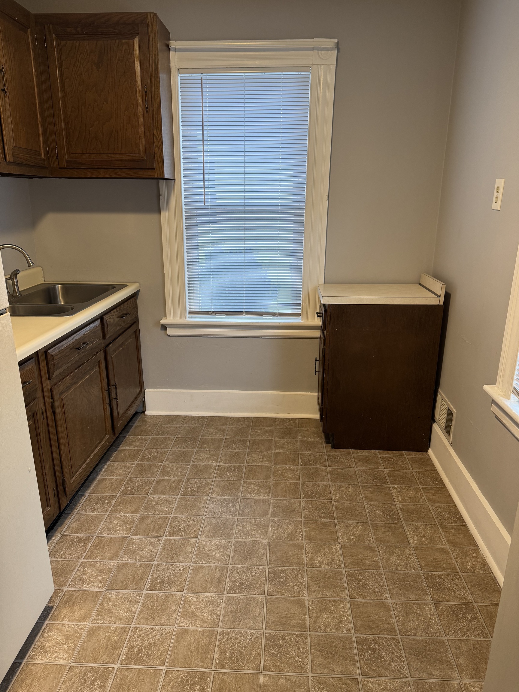 50 Holbrook Street Ansonia, CT 06401 - Photo 7 of 11 a view of kitchen with window and cabinets