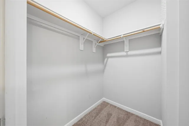 a view of a backyard with a garden and stairs