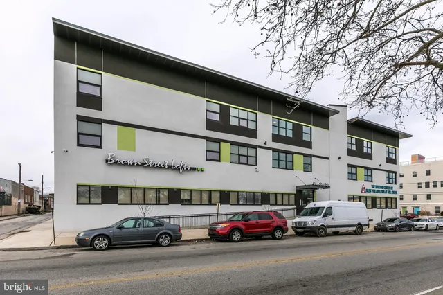 a car parked in front of a building