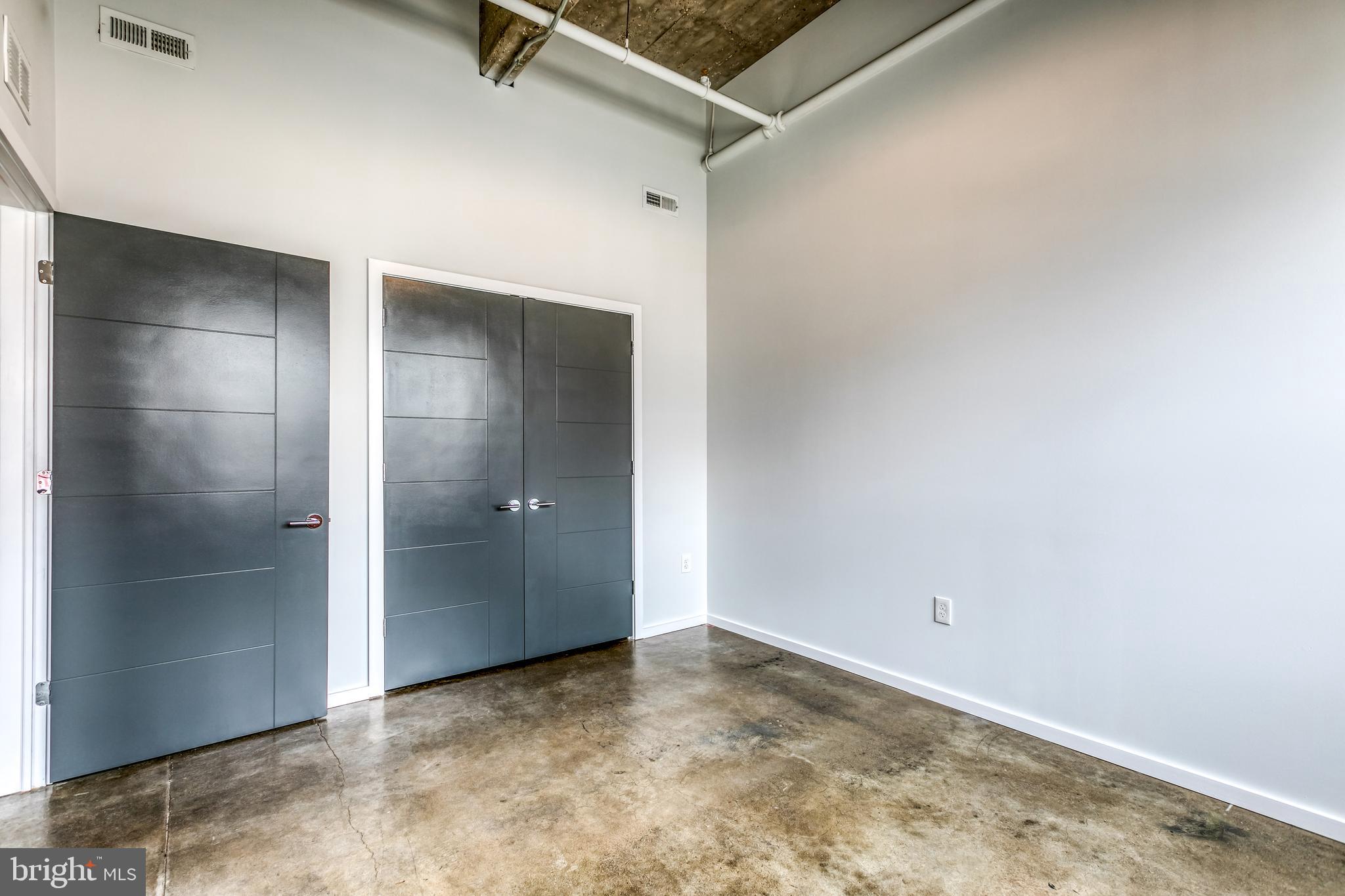 4800 Brown Street, Unit 306 Philadelphia, PA 19139 - Photo 8 of 22 an empty room with closet