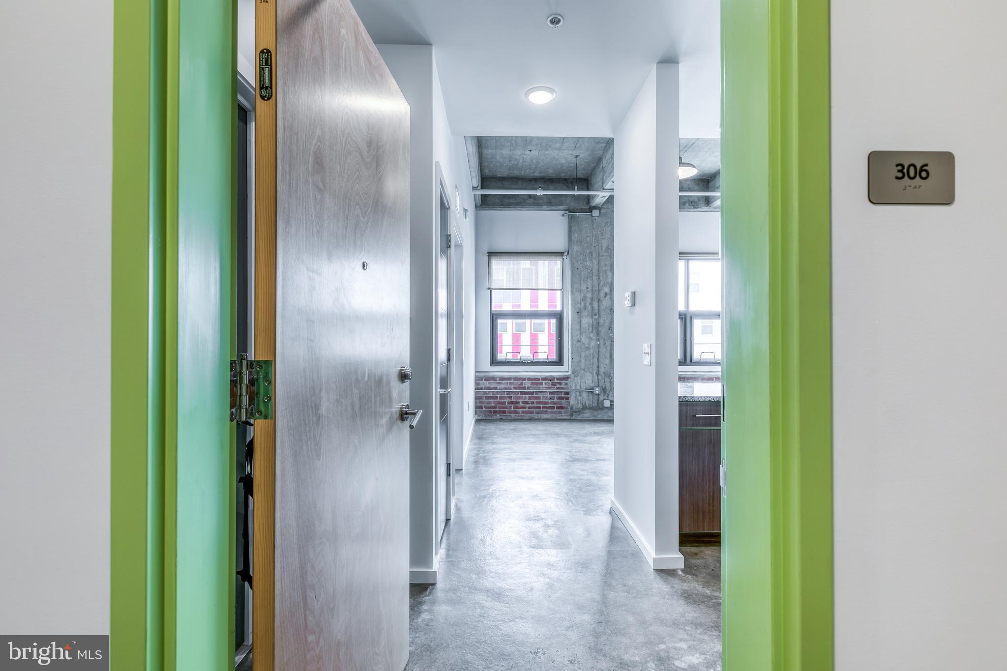4800 Brown Street, Unit 306 Philadelphia, PA 19139 - Photo 9 of 22 a view of a hallway with a elevator