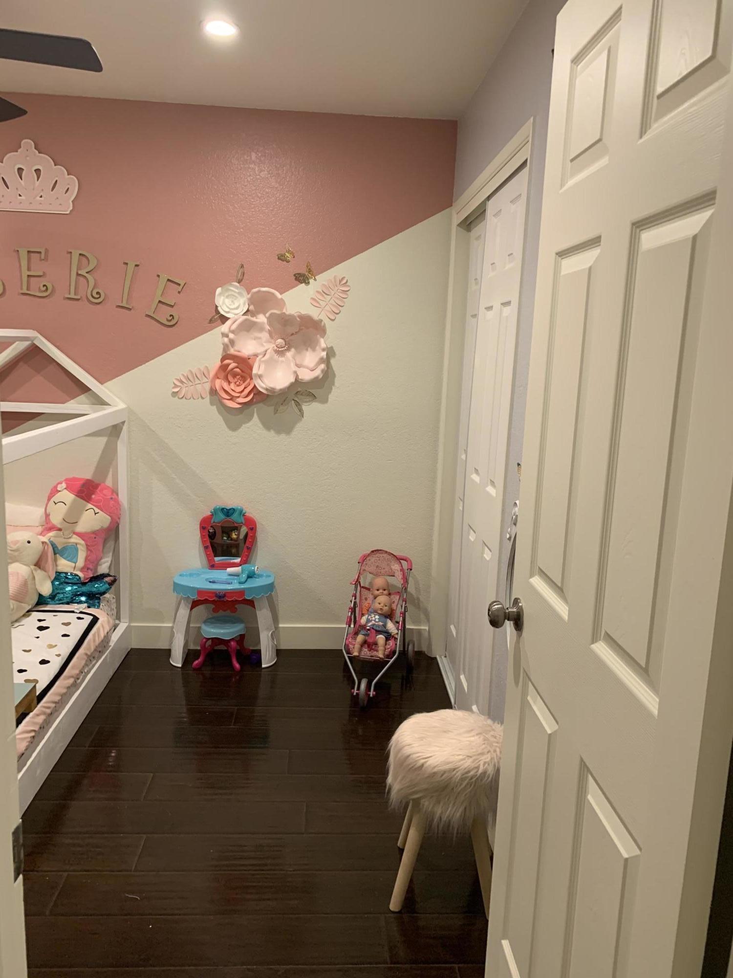 3096 East Avenue R-5 Palmdale, CA 93550 - Photo 12 of 22 a view of a bedroom with furniture and toys