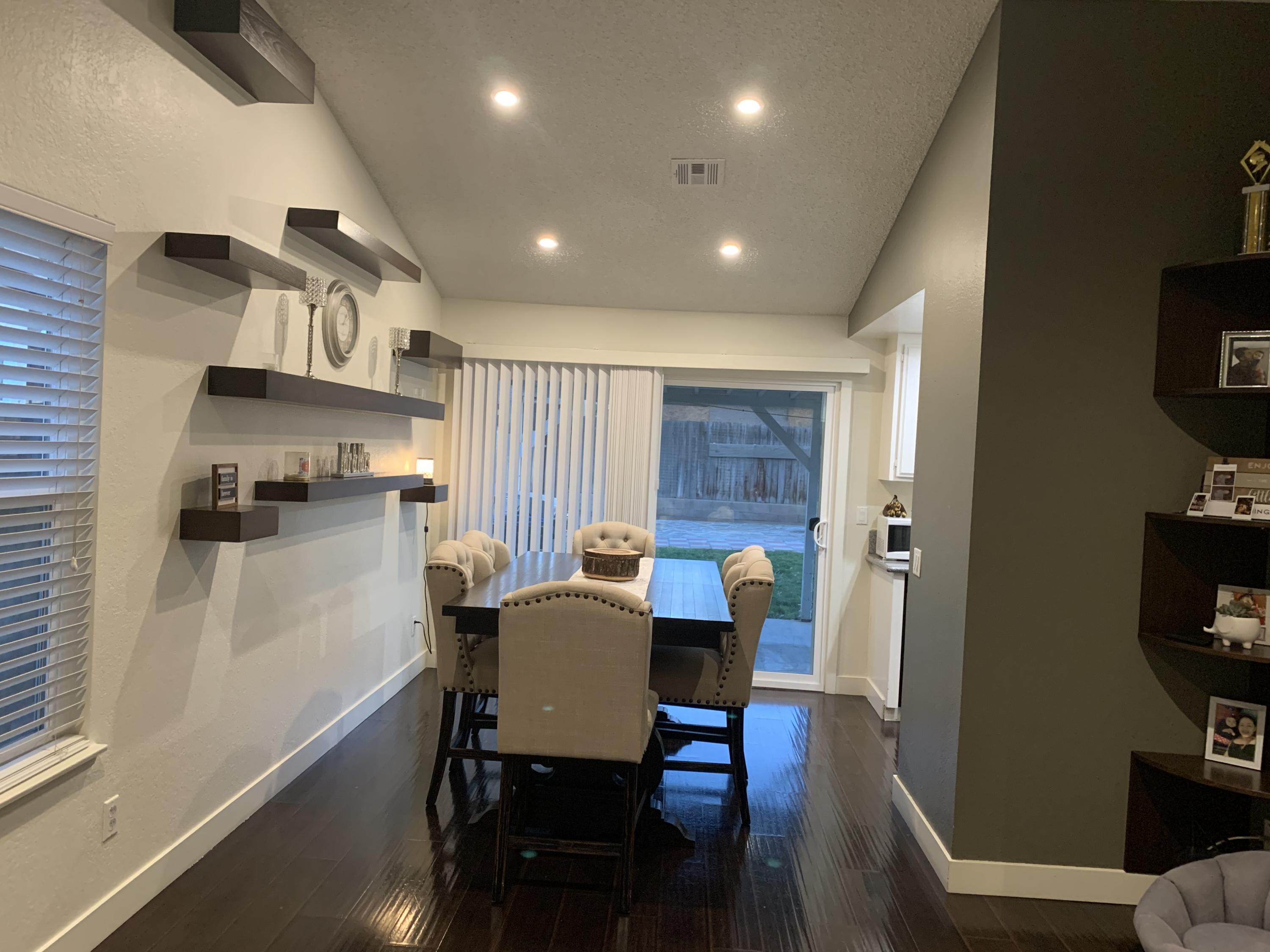 3096 East Avenue R-5 Palmdale, CA 93550 - Photo 5 of 22 a view of a dining room with furniture