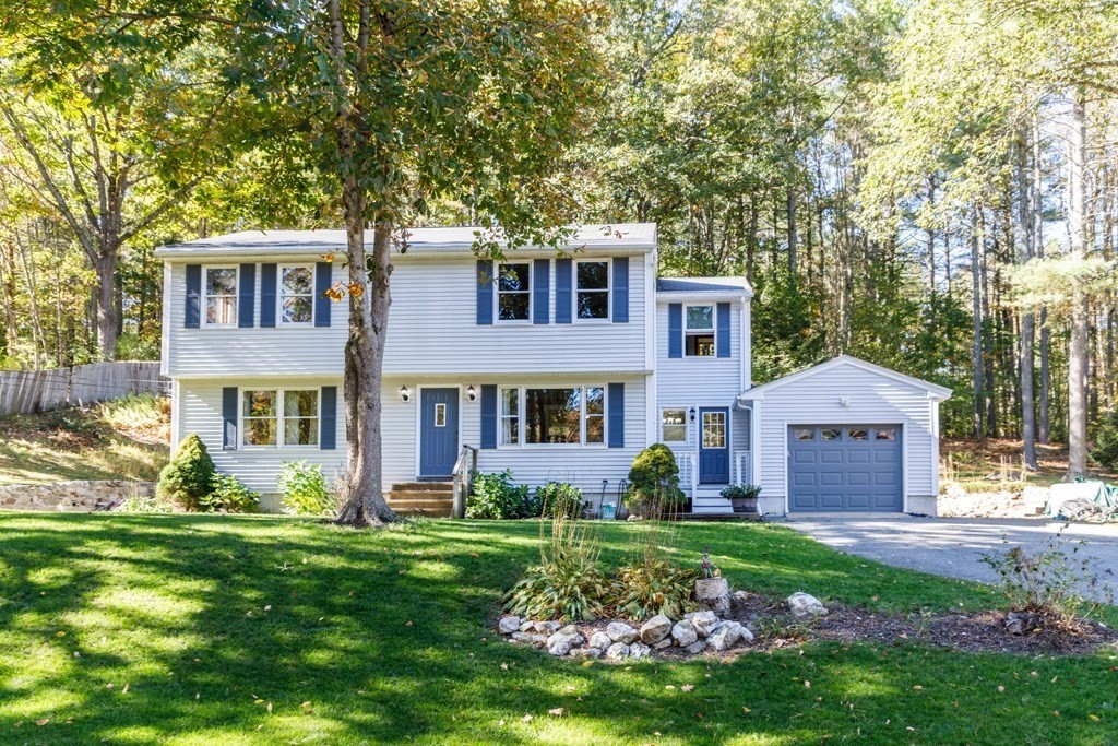 283 Mill Street Gardner, MA 01440 - Photo 1 of 30 front view of a house with a yard