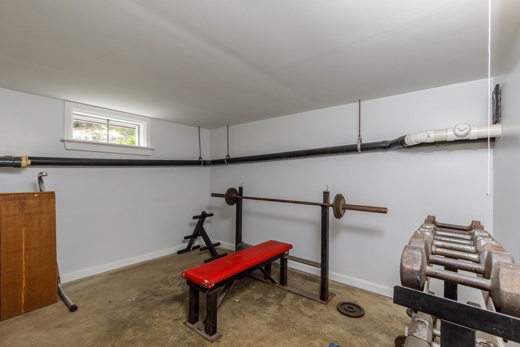 283 Mill Street Gardner, MA 01440 - Photo 19 of 30 a bedroom with furniture and a air conditioner vent