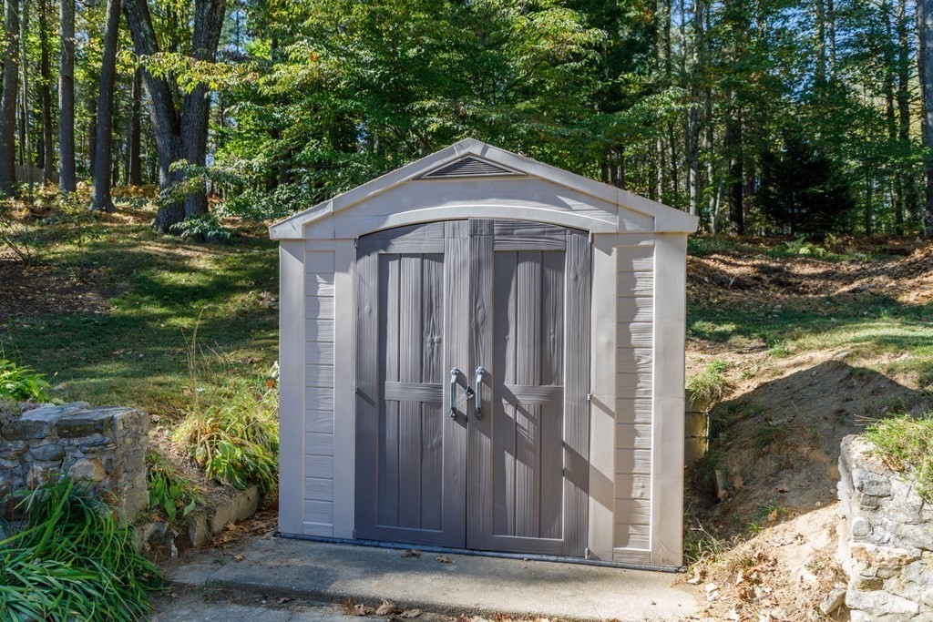 283 Mill Street Gardner, MA 01440 - Photo 22 of 30 a view of a small house with yard