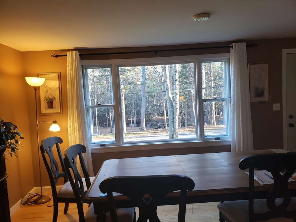 283 Mill Street Gardner, MA 01440 - Photo 29 of 30 a view of a dining room with furniture and window