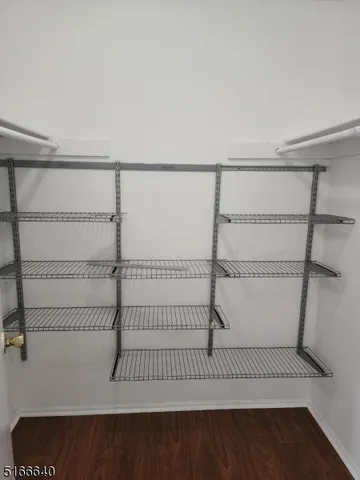 a view of a room with racks on the wall