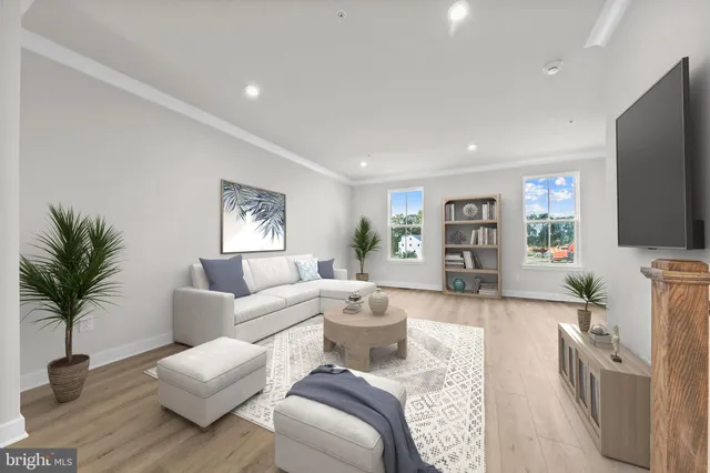 a bedroom with a bed and a flat screen television