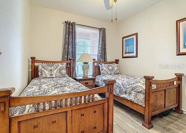 a bathroom with a sink mirror and toilet